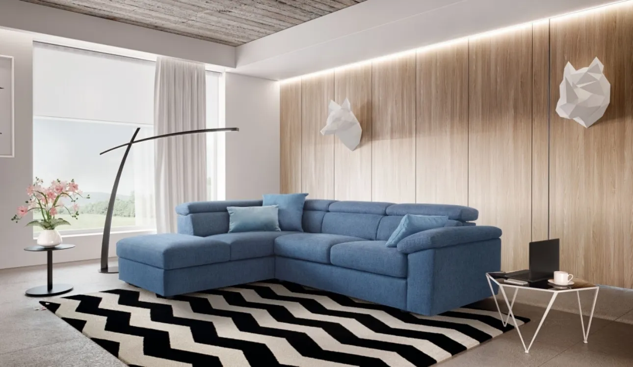 Divano angolare in tessuto con pouf contenitore Adela di Le Comfort